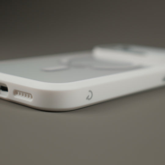 iPhone 17 Pro and 17 Pro Max Qcaze DUO Polar White Case and Skin Kit Close Up  Logo